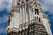 Bangkok Wat Arun - The top section of the Phra Prang is guarded at the four cardinal points by the Hindu god Indra on his three-headed elephant Erawan.